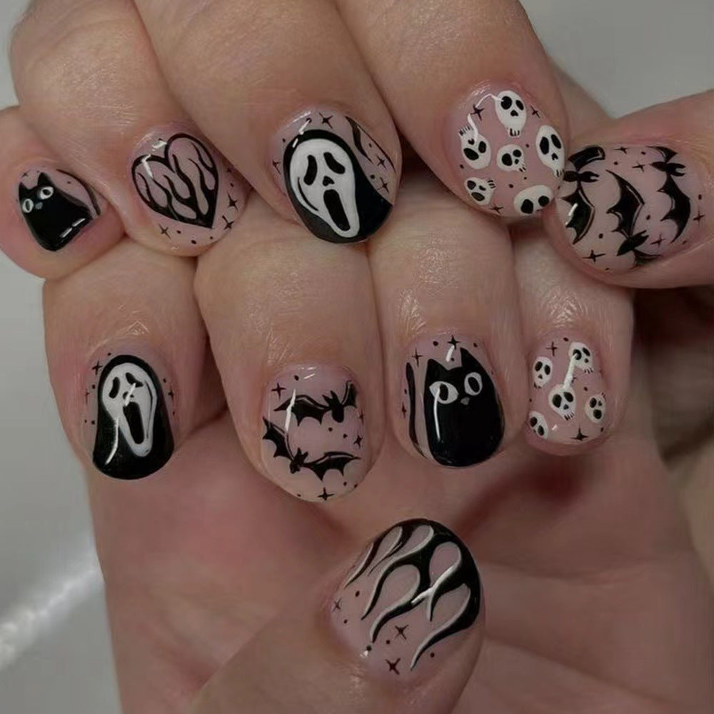 Spooky Charm Short-Length Oval Black and Beige Press-On Nail Set with Halloween Motifs