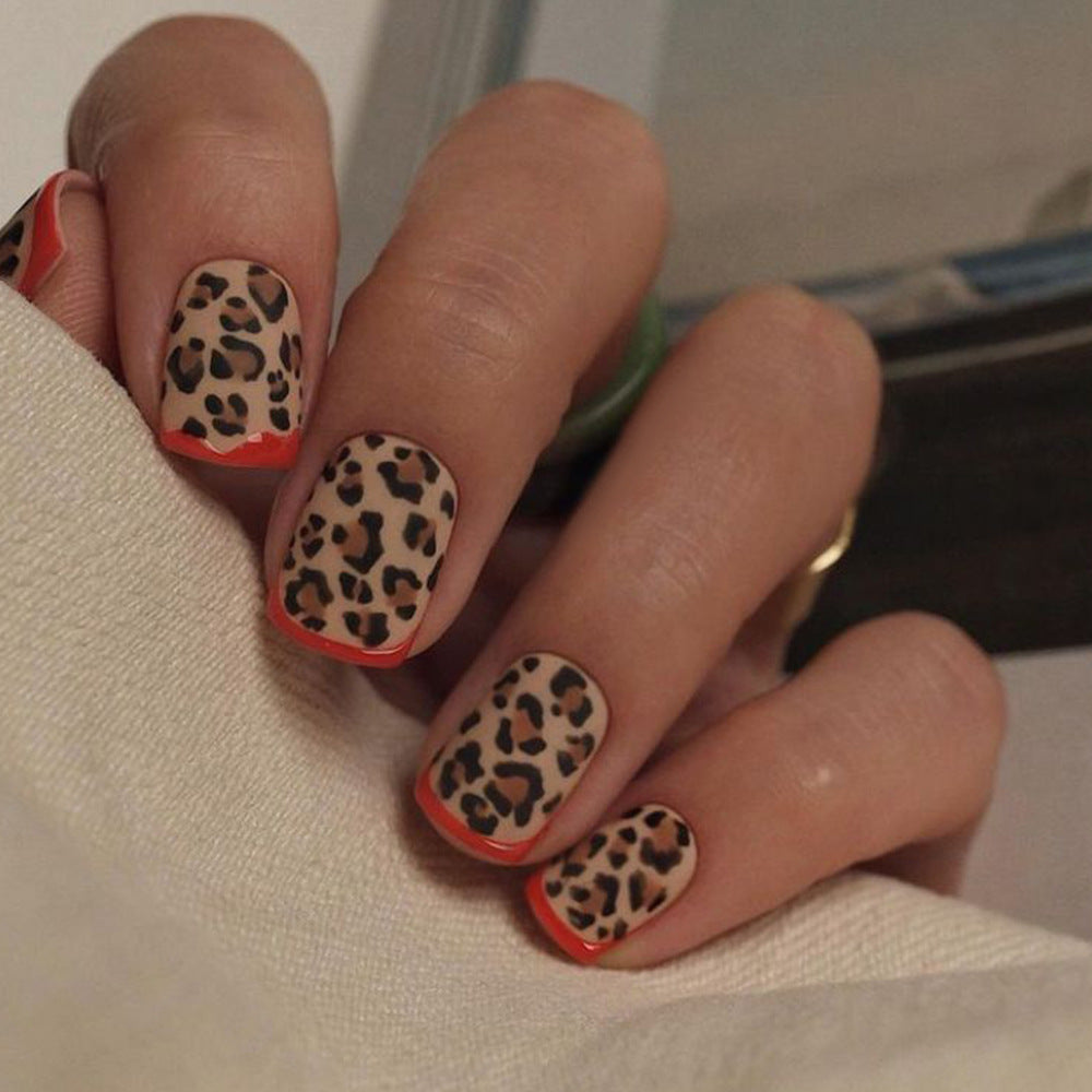 Safari Chic Short Length Square Press On Nail Set with Leopard Print Design and Bold Red Accents