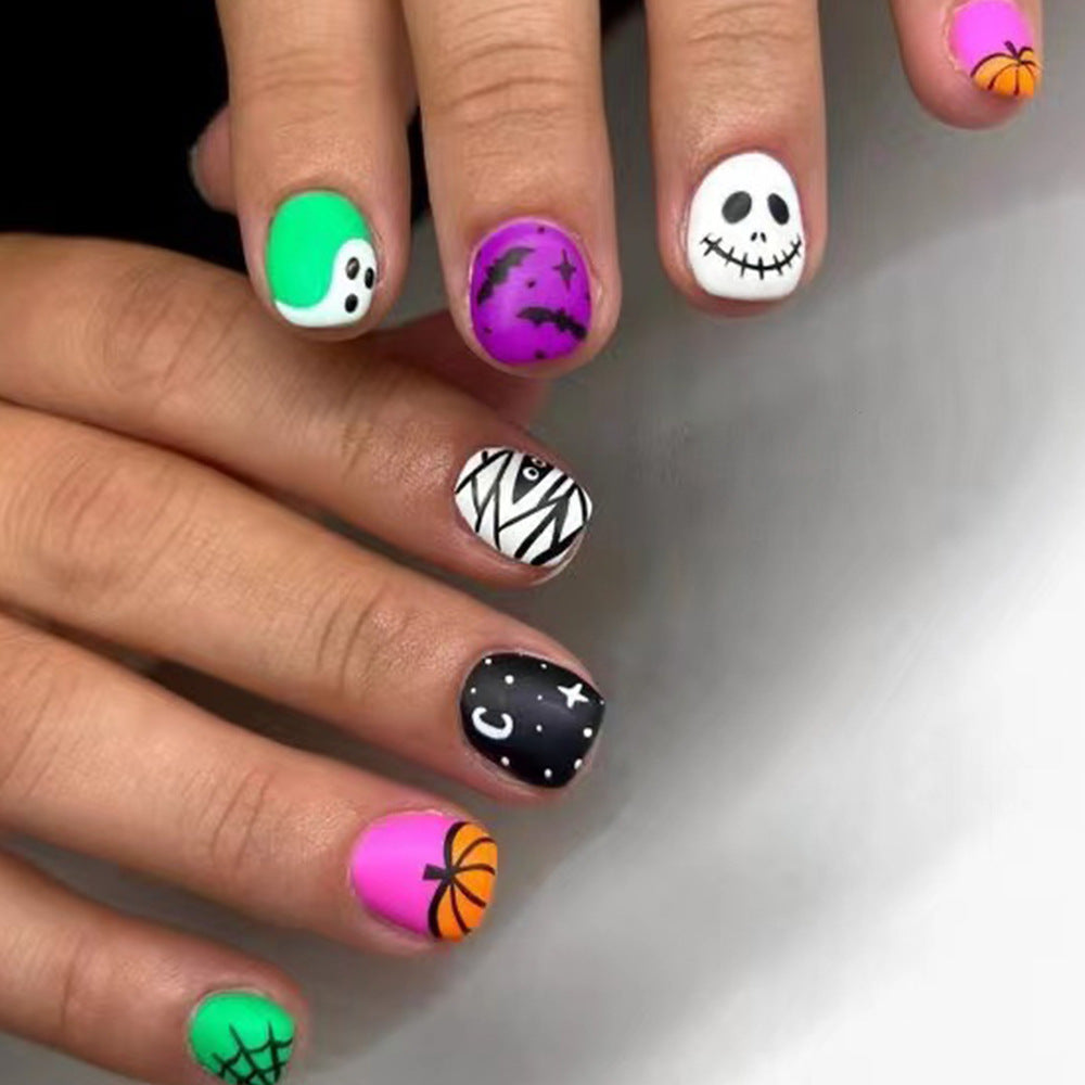 Spooky Spectacle Short Length Round Multicolor Halloween Themed Press On Nail Set with Glow-in-the-Dark Accents