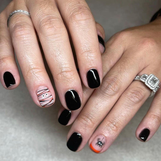 Spooky Elegance Short-Length Oval Black Press On Nails with Halloween Accent Art