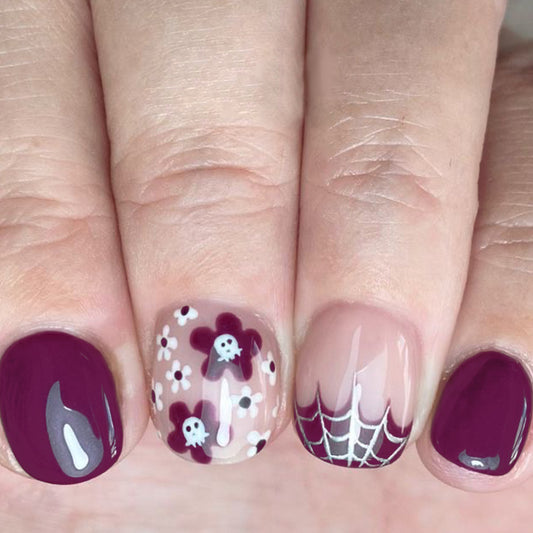 Spooky Elegance Short Oval Burgundy and Beige Press On Nail Set with Floral Skull Design