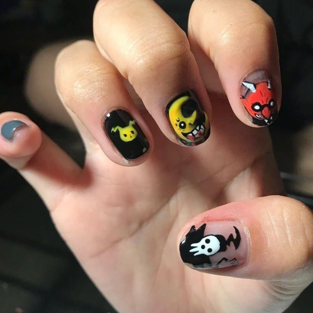 Spooky Fun Short Oval Multicolor Cartoon Monster Press On Nail Set with Glow-in-the-Dark Accents