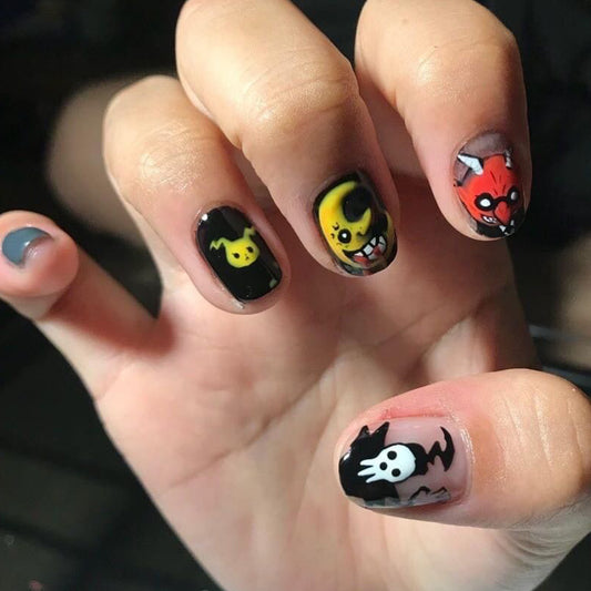 Spooky Fun Short Oval Multicolor Cartoon Monster Press On Nail Set with Glow-in-the-Dark Accents