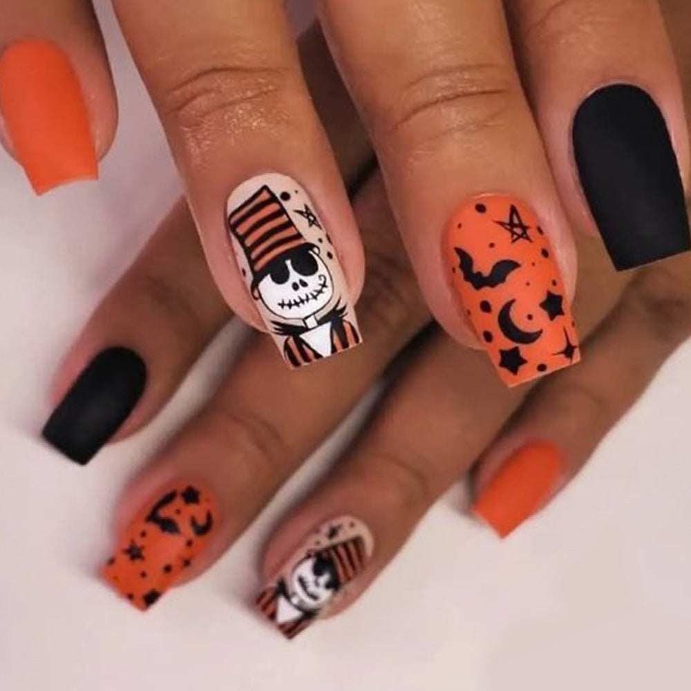 Spooky Halloween Square Long Matte Black and Bright Orange Press On Nail Set with Unique Skeleton Design