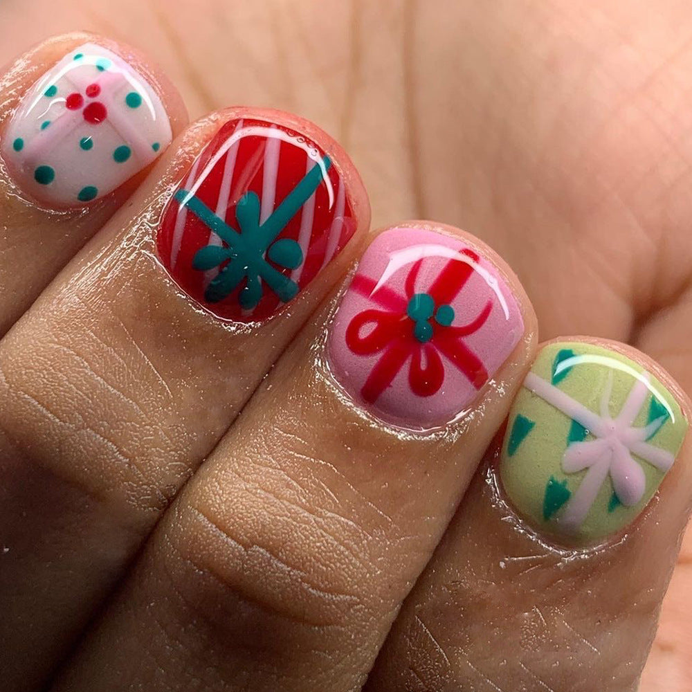Whimsical Floral Fantasy Short Oval Multi-Color Press On Nail Set with Charming Bow Designs