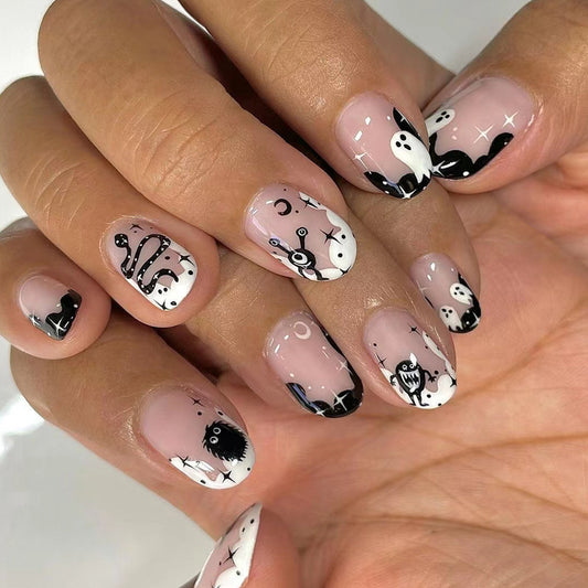 Spooky Nights Medium Oval Pink and Black Glow in the Dark Press On Nail Set