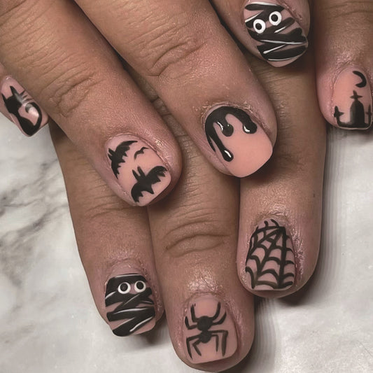 Spooky Season Short Oval Black and Beige Press On Nail Set with Halloween Themed Designs