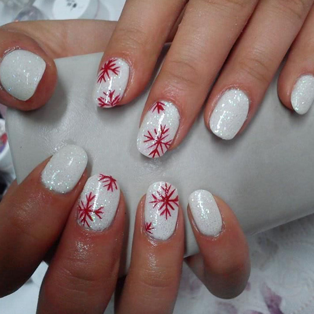 Winter Wonderland Medium Oval Shaped White Sparkle Press On Nail Set with Festive Red Snowflake Design