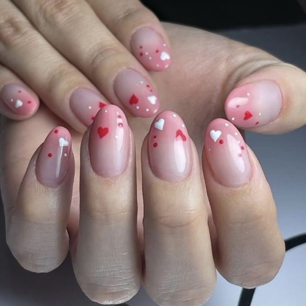 Romantic Blossom Medium Almond Pink Nail Set with Heart Accents