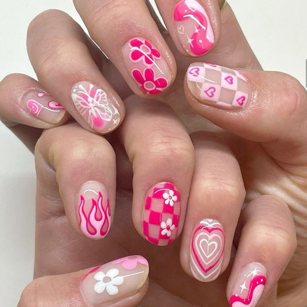 Charming Blossom Fantasy Short Round Pink Press On Nail Set with Whimsical Floral Designs