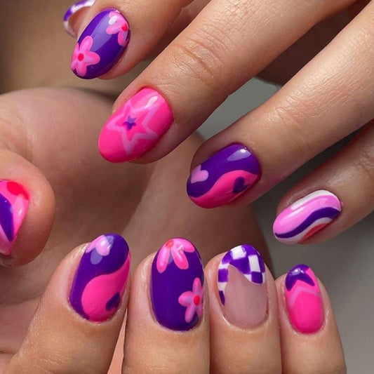 Whimsical Spring Inspired Short Oval Shaped Vibrant Pink and Purple Press On Nail Set with Artistic Floral and Abstract Designs