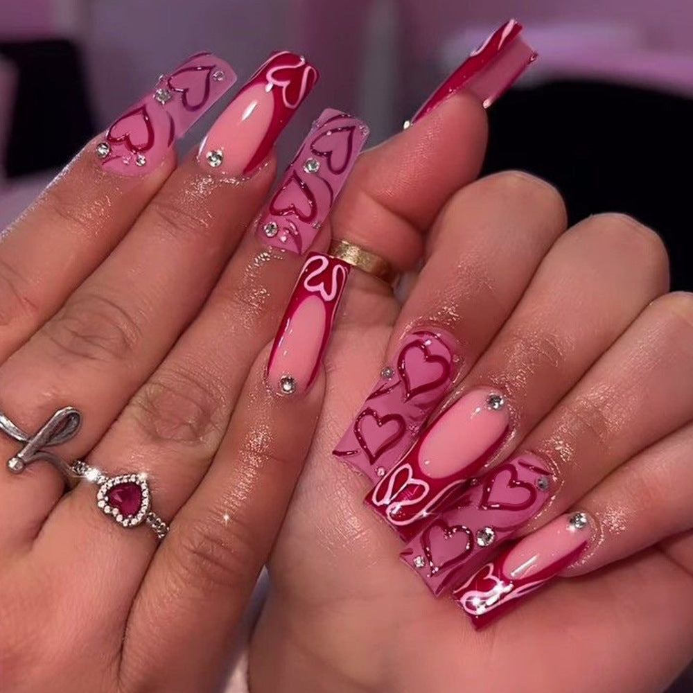 Love Inspired Long Square Gradient Pink Nail Set with Heart Patterns and Gemstone Accents