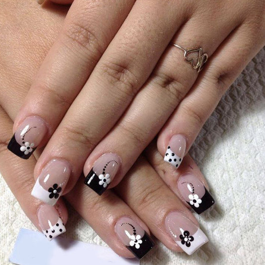Floral Elegance Medium Square Glossy Black and White Press On Nail Set with Charming Flower Accents