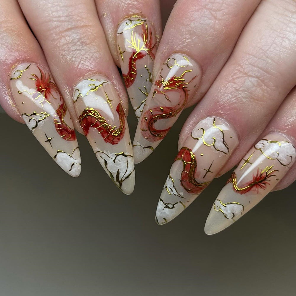 Enchanting Elegance Extra-Long Stiletto Cream Press On Nail Set with Gold Foil Accents and Distinctive Marble Design