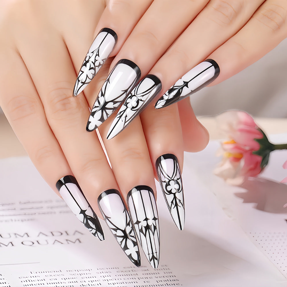 Elegant Floral Fantasy Long Stiletto Press On Nail Set in Black and White with Intricate Floral Designs