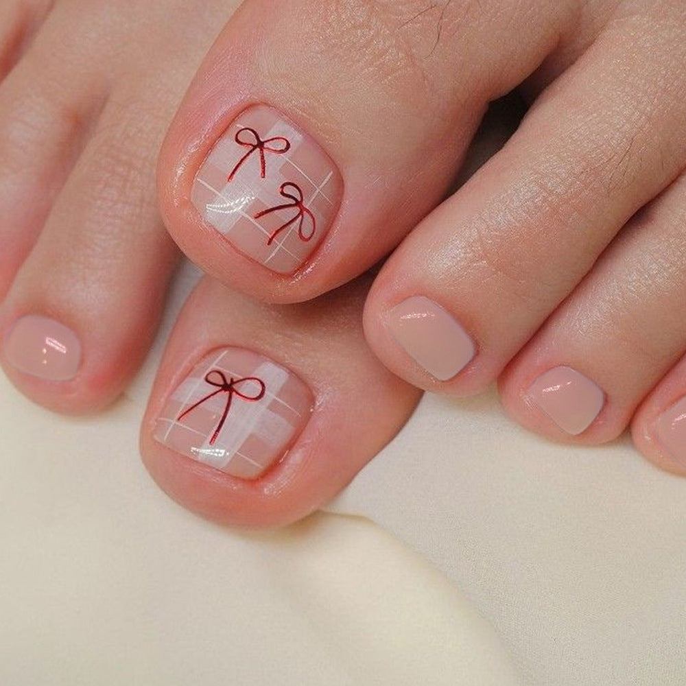 Charming Celebration Short Square Beige Press On Toenail Set with Elegant Red Ribbon Accents