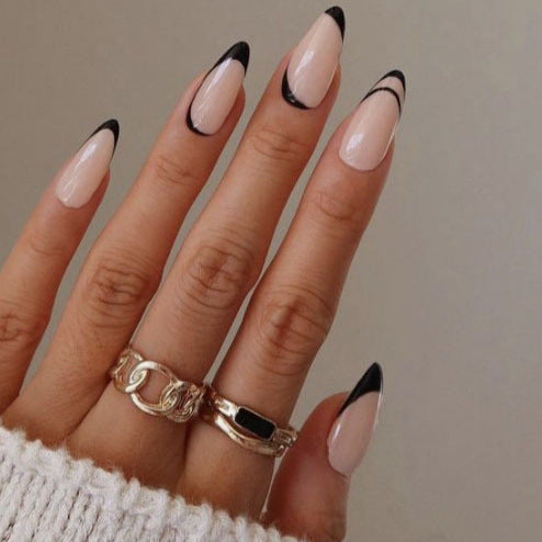 Chic Elegance Long Almond Beige Nails with Black Tips and Unique Double Line Design
