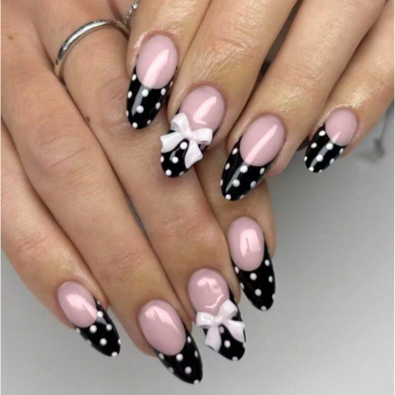 Chic Polka Dot Glamour Long Almond Shaped Pink and Black Press On Nail Set with Elegant Bow Accents