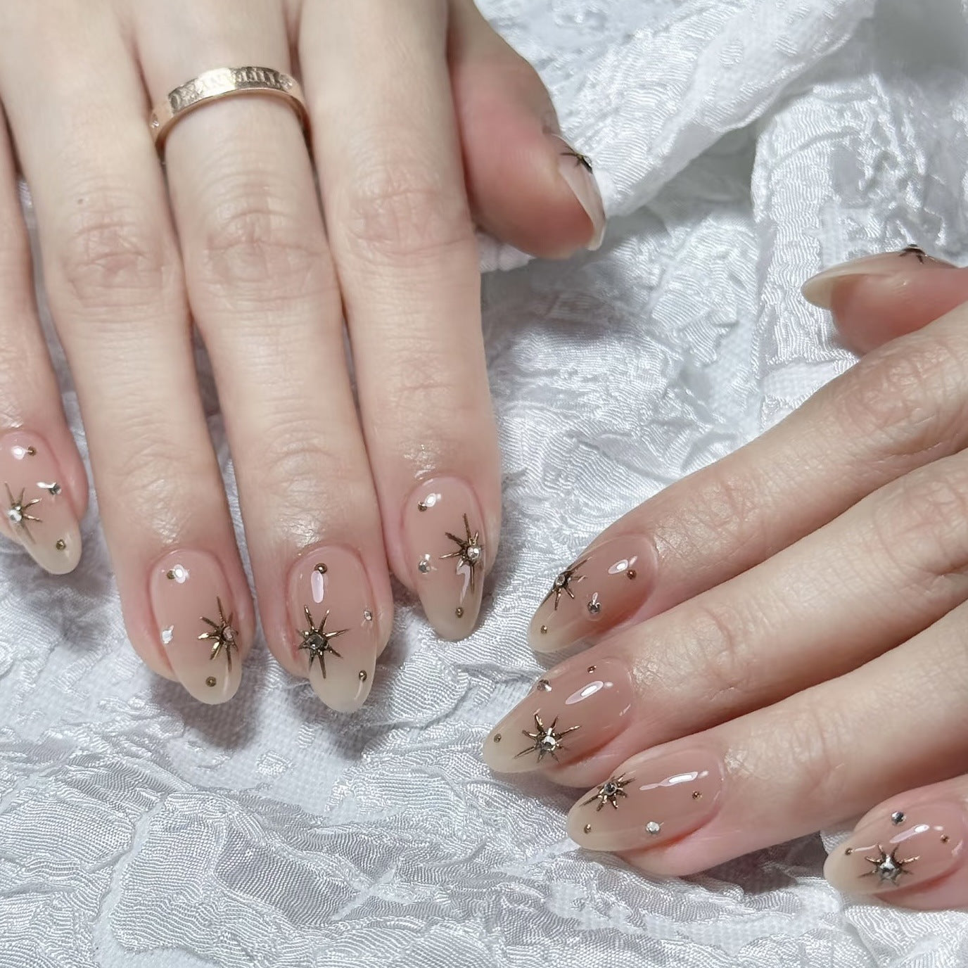 Celestial Elegance Press On Nail Set Medium Oval Beige with Dazzling Star Accents
