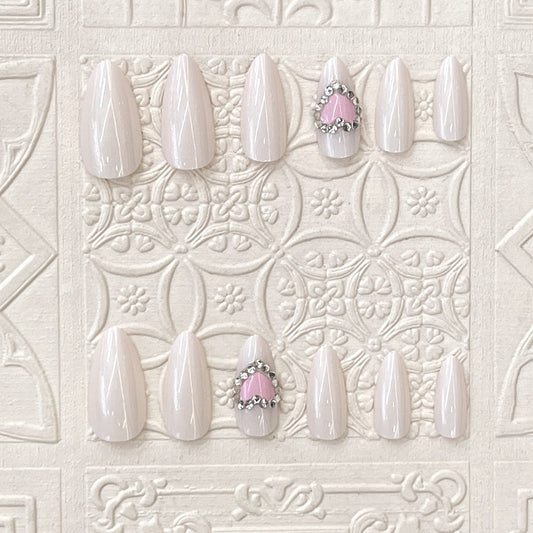 Whimsical Elegance Long Almond Pale Pink Press On Nail Set with Heart and Gemstone Accent