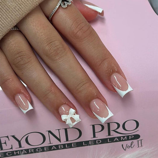 Chic Elegance Medium Square White Nails with Stylish Bow Detail