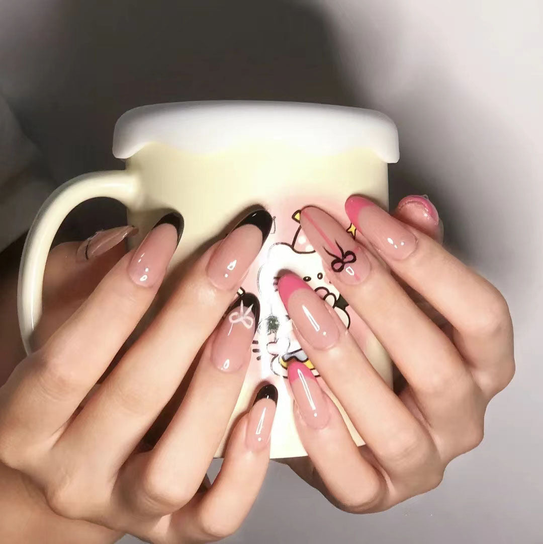Cute Kitty Inspired Long Oval Shaped Pink and Black Press On Nail Set with Adorable Bow Accents