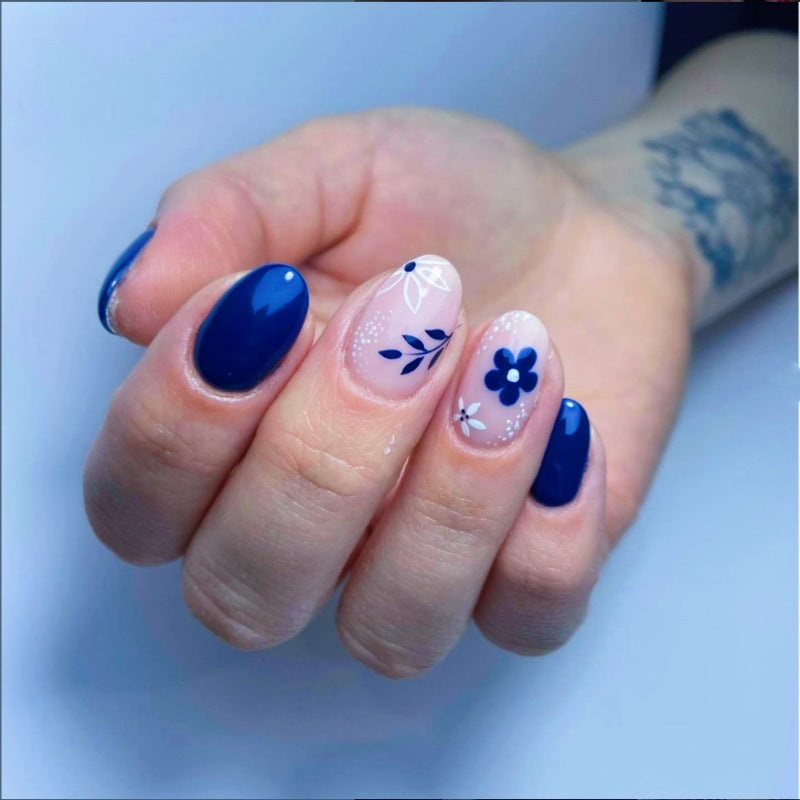Midnight Floral Elegance Medium Oval Navy Blue and White Press On Nail Set with Flower Accents