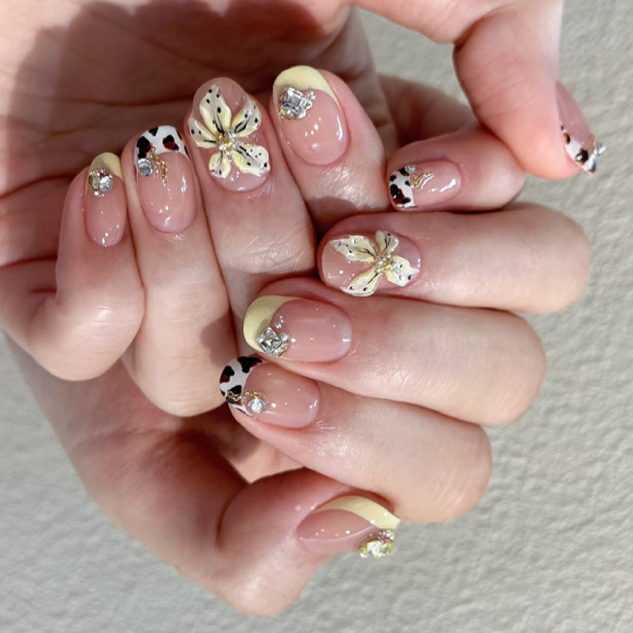 Whimsical Floral Impress Press on Nails Short Oval Transparent with Yellow Tips and Dazzling Gems