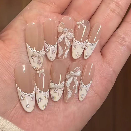 Whimsical Elegance Long Almond Beige and White Press On Nail Set with Charming Bow Accents