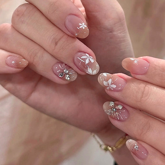 Whimsical Garden Inspired Press On Nail Set Medium Almond Shaped Soft Pink with Elegant Floral and Gem Accents