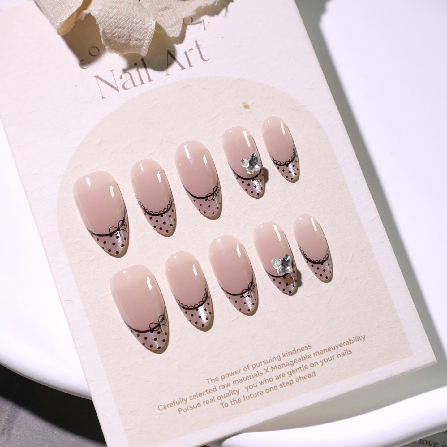 Delicate Charm Medium Almond Blush Pink with Elegant Bow and Dazzling Gemstone Accent Press On Nail Set