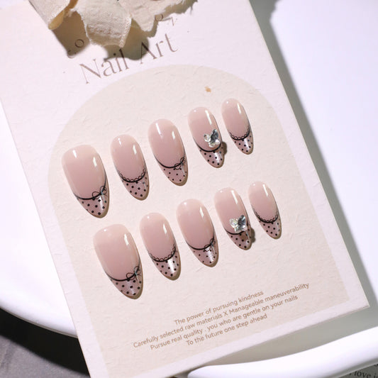 Delicate Charm Medium Almond Blush Pink with Elegant Bow and Dazzling Gemstone Accent Press On Nail Set