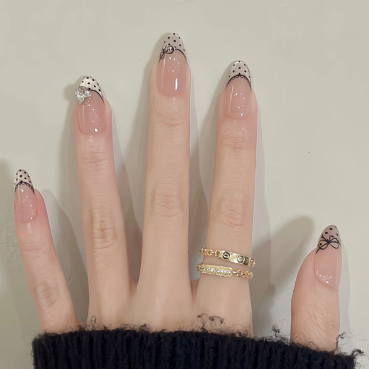 Chic Romance Medium Almond Beige with Elegant Black Tip and Gemstone Accent Press-On Nail Set