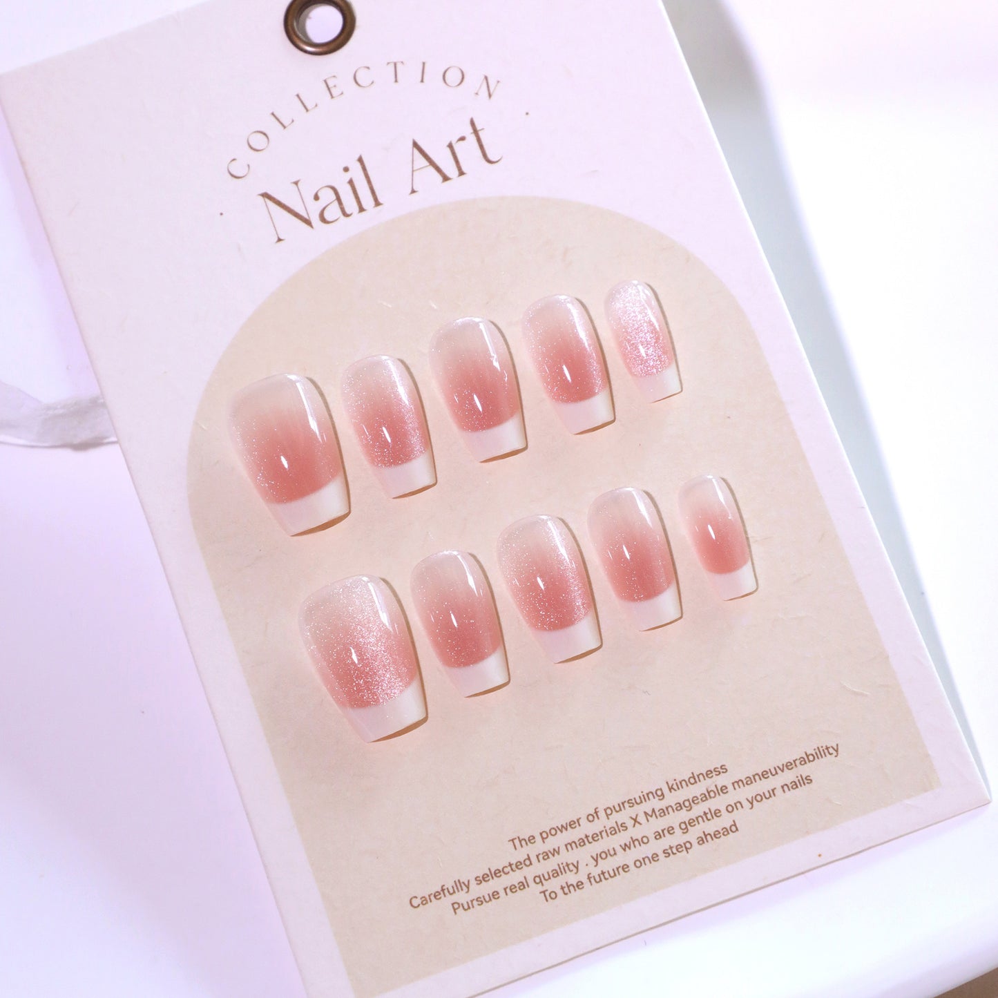 Set of gradient nail art on a display card with 'Collection' branding.