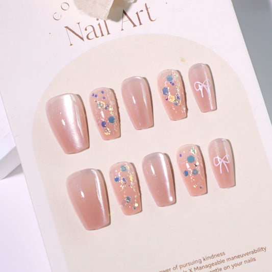 Charming Pastel Medium Coffin Press On Nail Set in Sheer Pink with Glitter and Bow Accents