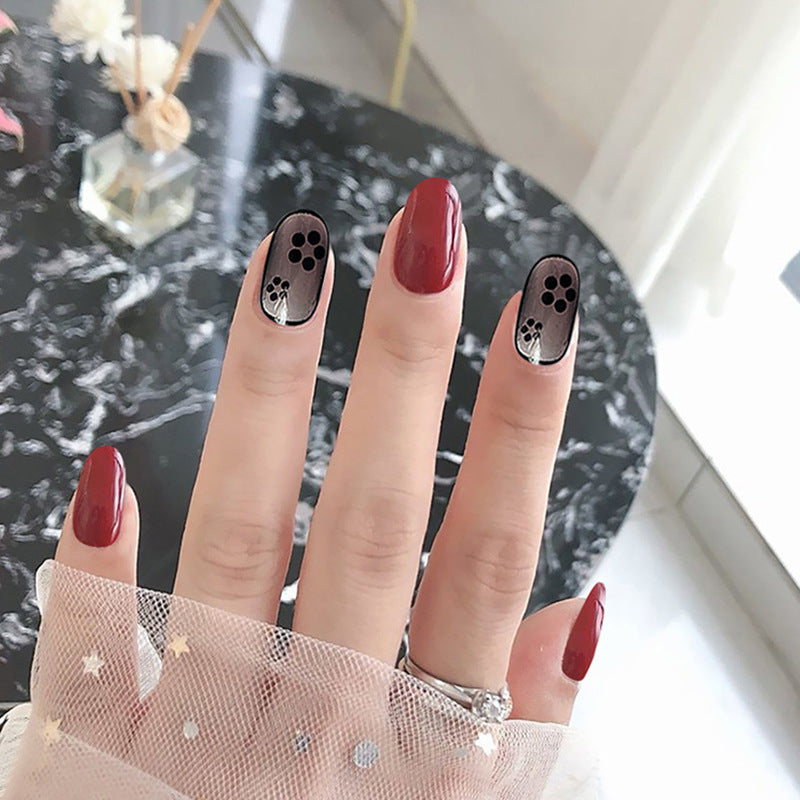 Gothic Elegance Medium Oval Burgundy and Black Gradient Press On Nail Set with Floral Accents