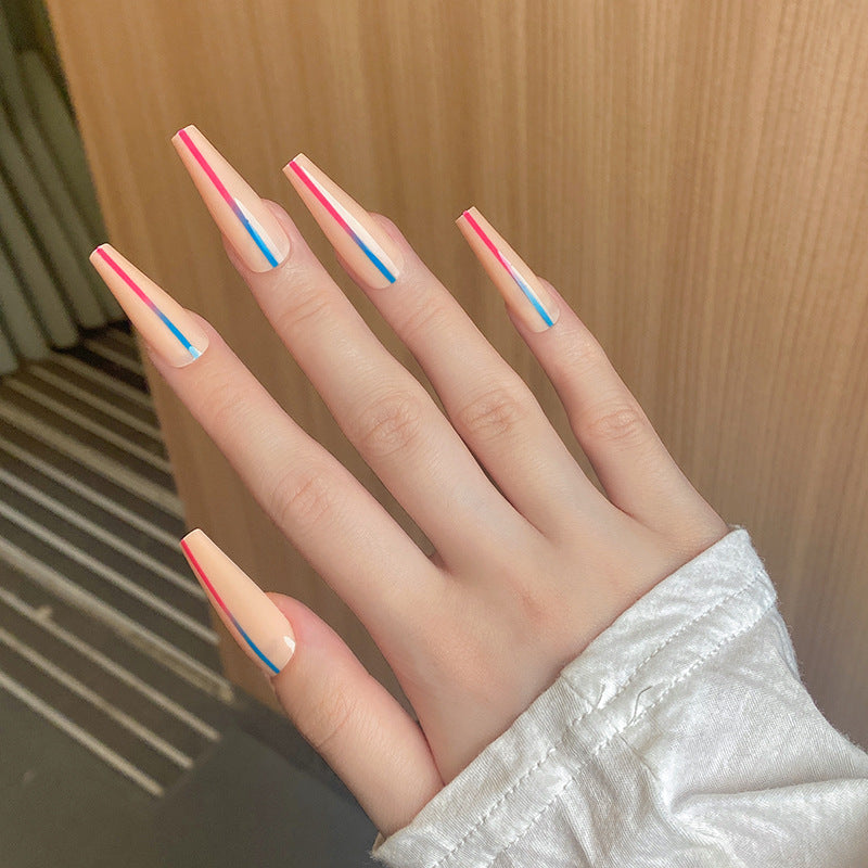 Elegant Sunset Long Coffin Peach Press On Nail Set with Colorful Accent Stripes