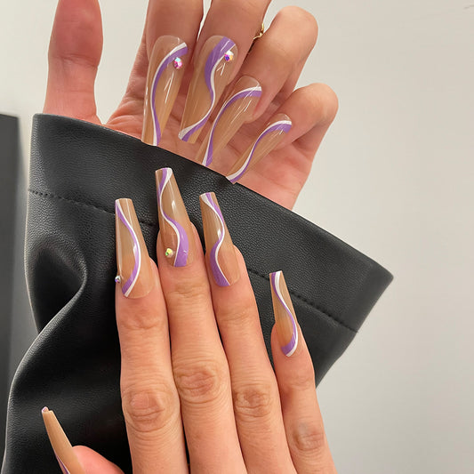 Dreamy Swirl Long Coffin Press On Nails in Transparent Beige with Purple Curves and Dazzling Rhinestones