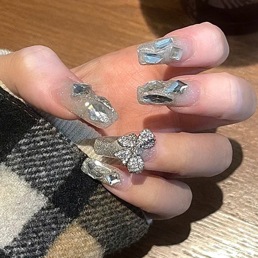 Glamorous Crystaline Long Coffin Silver Nail Set with Dazzling Butterfly Accent