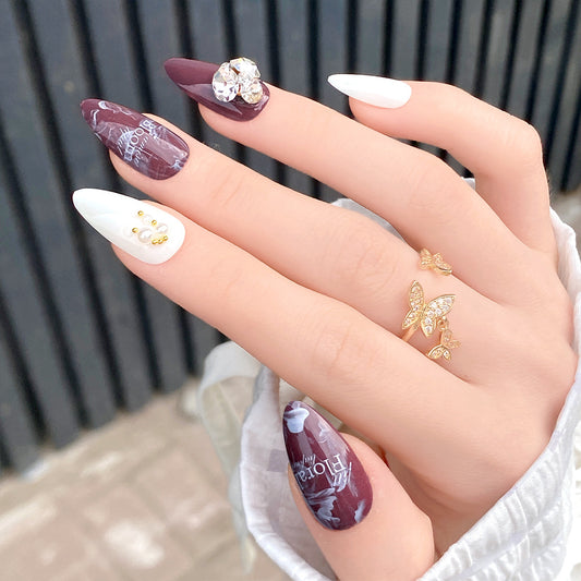 Glamorous Elegance Long Almond Burgundy and White Press On Nail Set with Gemstone Accents and Artistic Designs