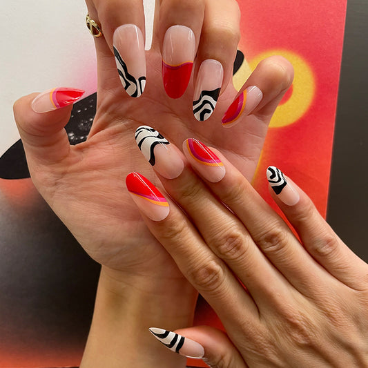 Fashionably Bold Long Almond Red and Black Press On Nail Set with Unique Abstract Design