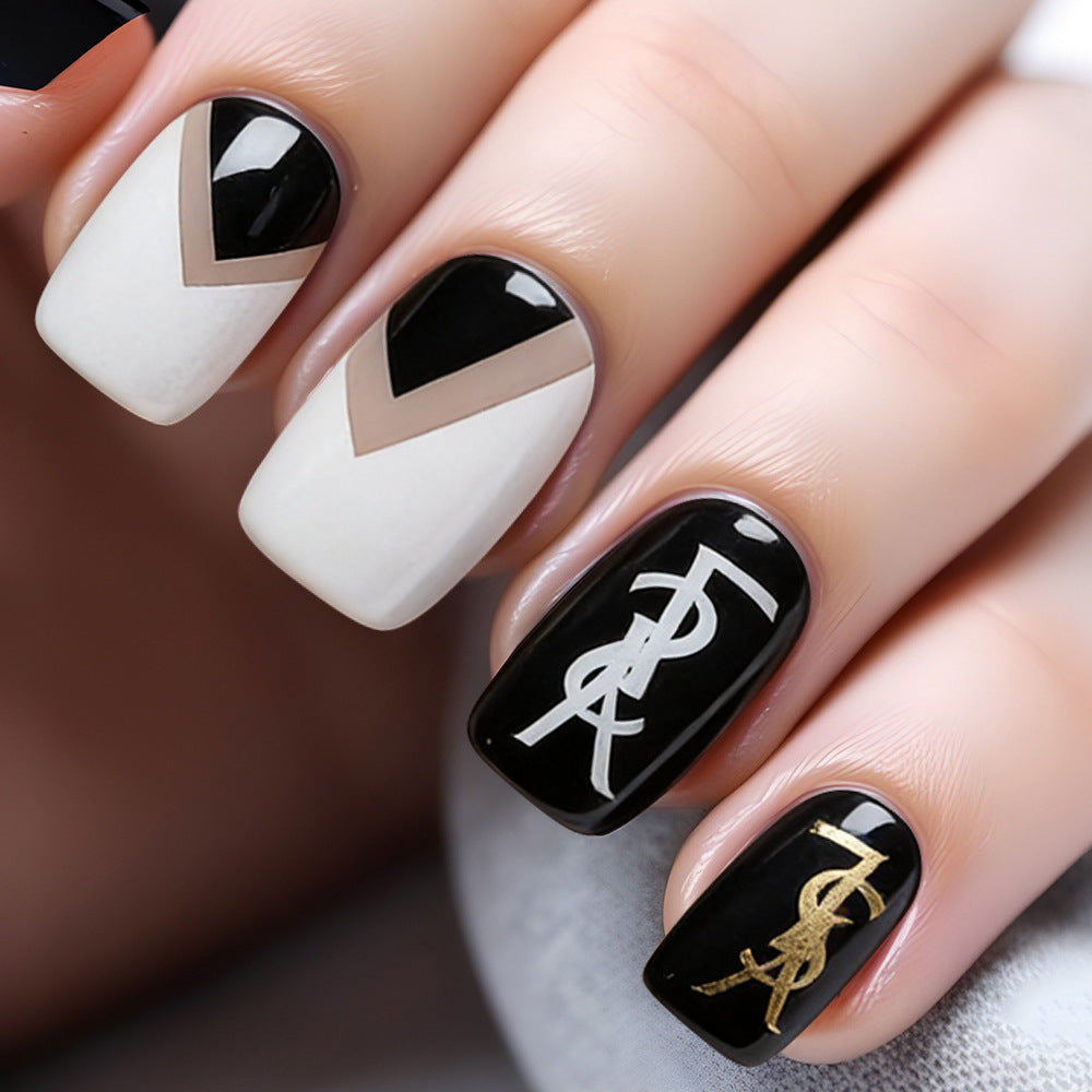 Chic Elegance Square Medium Black and White Nail Set with Unique Geometric Design