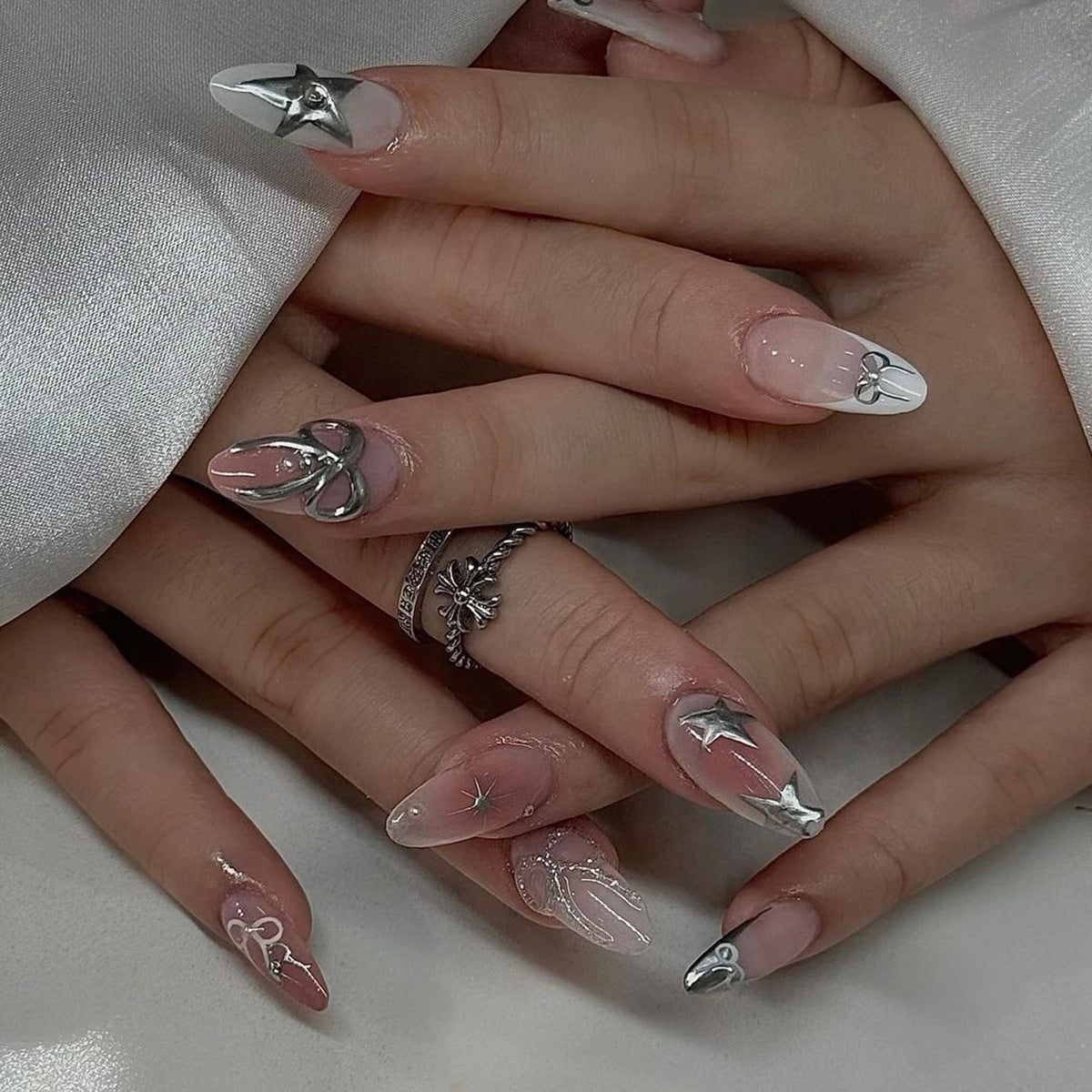 Stargazer Bliss Medium Almond Pale Pink Press On Nails with Silver Accents and Celestial Charms