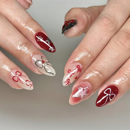 Charming Holiday Red Medium Almond Press-On Nail Set with Unique Bow and Star Designs