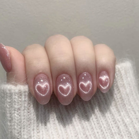 Enchanted Romance Medium Round Pink Press On Nail Set with Heart Accents and Shimmer Finish