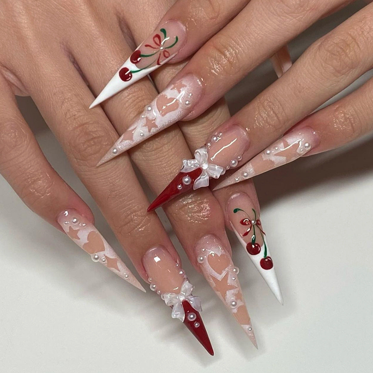 Festive Holiday Long Stiletto Gradient Red and White Press On Nail Set with Sparkling Rhinestone Accents