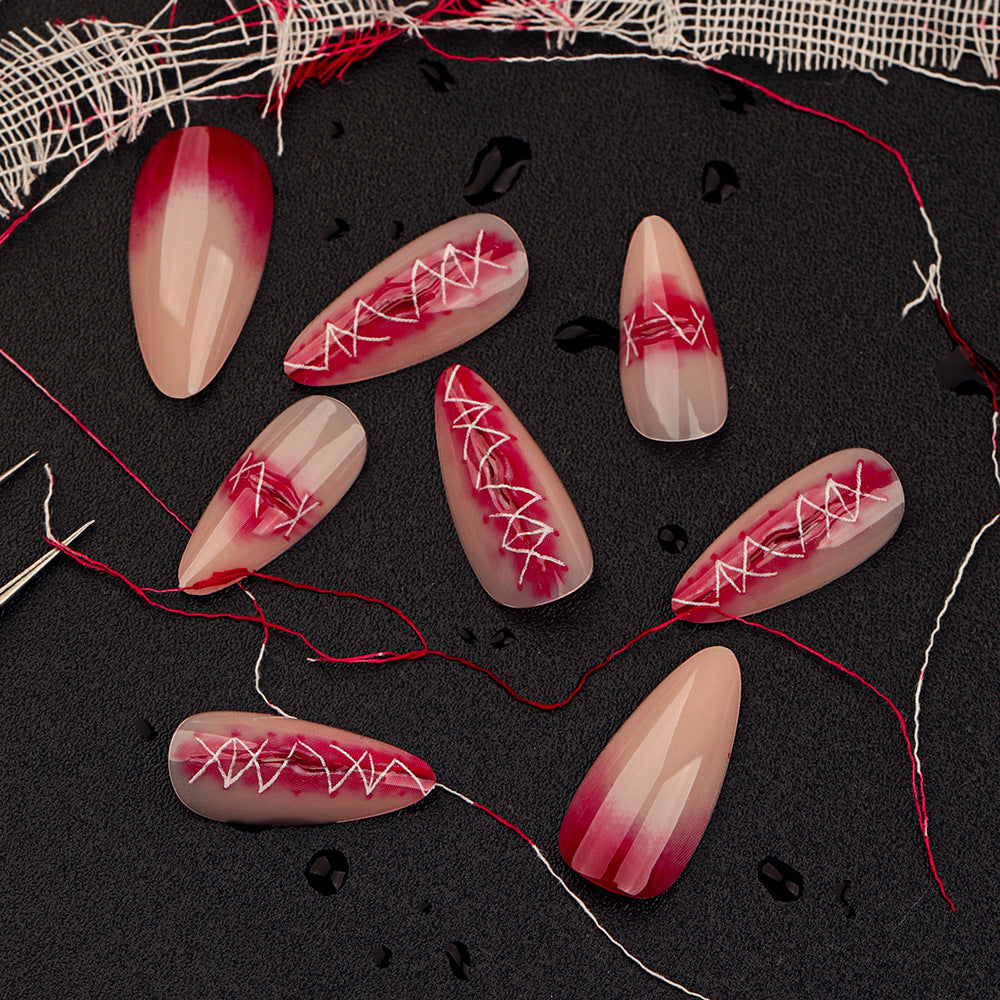 Crimson Seduction Long Almond Gradient Red Fake Nail Set with White Laced Design