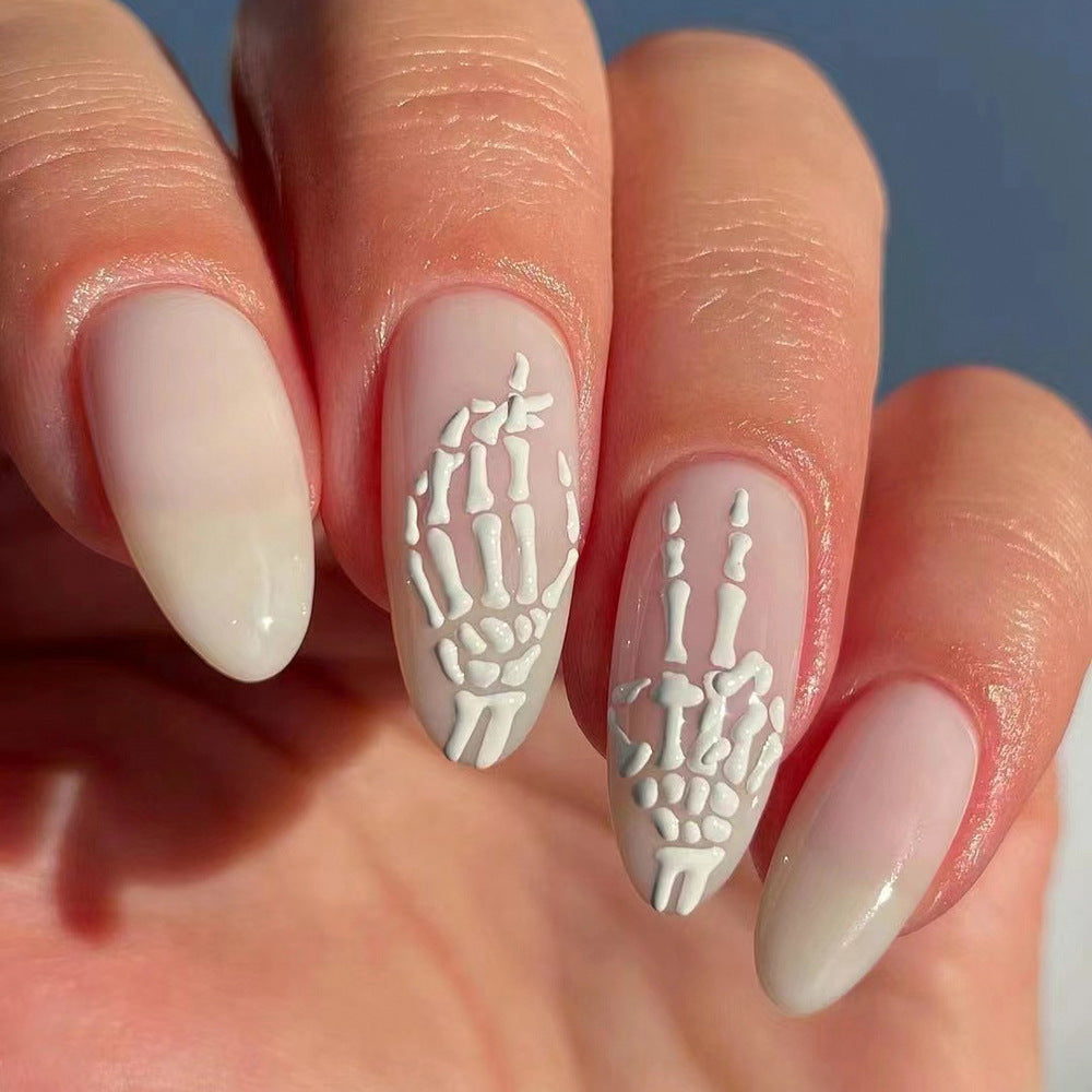 Skeleton Elegance: Long Almond Beige Press On Nails with 3D Bone Design