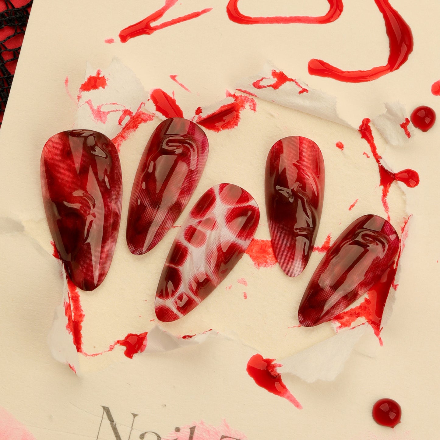 Vampire Chic Medium Almond Shape Burgundy Marble Press On Nail Set with Glossy Finish