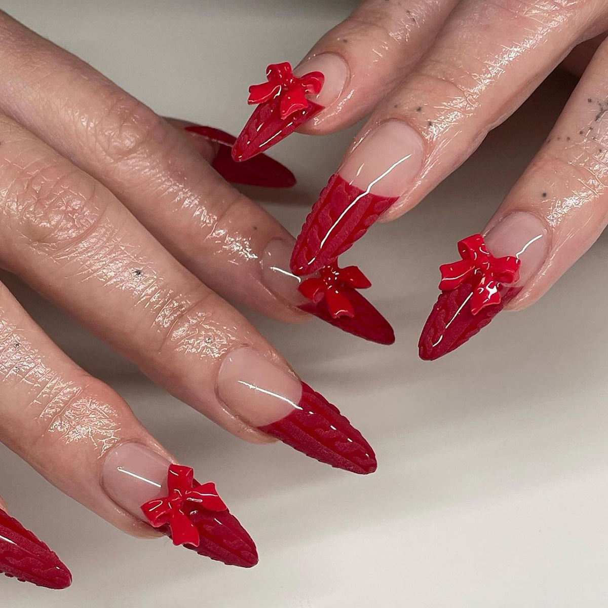 Festive Treats Long Almond Red Press On Nails with 3D Bow Accents